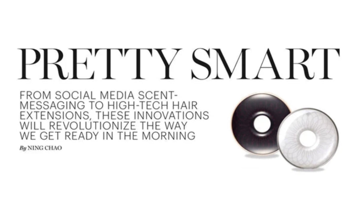 Marie Claire article cover saying "Pretty Smart" in bit letters next to a black circle and a white circle both with holes in the center